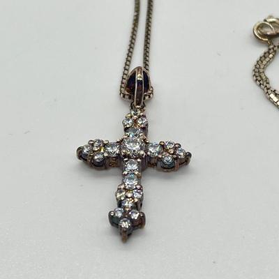 LOT 62: Sterling Silver Diamonique Cross Pendant on 20