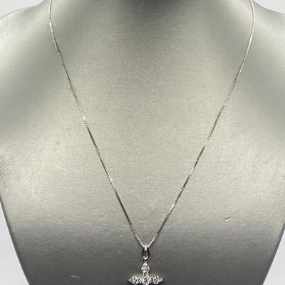 LOT 62: Sterling Silver Diamonique Cross Pendant on 20