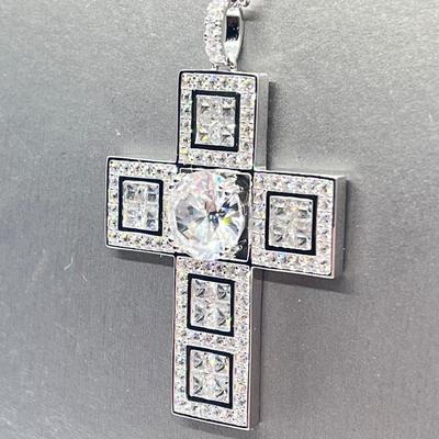 LOT 65:  Diamonique Sterling Silver Cross on 24