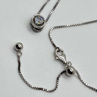 LOT 75: Sterling Silver & CZ Sliding Pendant on 20: Adjustable Silver Chain