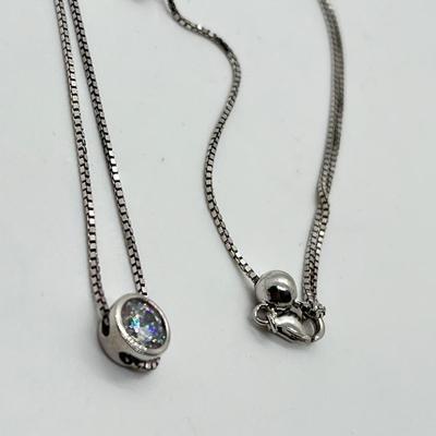 LOT 75: Sterling Silver & CZ Sliding Pendant on 20: Adjustable Silver Chain