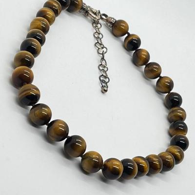 LOT 93: Tiger's Eye 12mm Gemstone Bead Necklace - 16