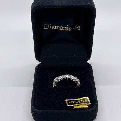LOT 99: Diamonique Brilliant Round 14K White Gold Eternity Ring - Size 6 - 3.65 grams total weight