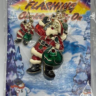 LOT 130: Four Sets Flashing Christmas Pins with Matching Earrings - Sealed, Untested
