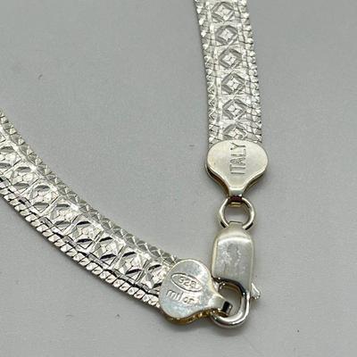 LOT 165: Sterling Silver 18" Diamond Cut Herringbone Necklace 23 gtw