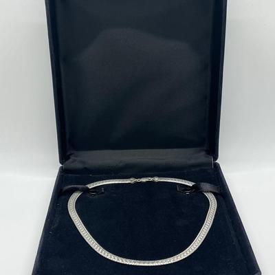 LOT 165: Sterling Silver 18" Diamond Cut Herringbone Necklace 23 gtw