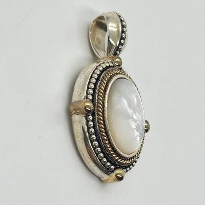LOT 176: Sterling Silver Pendant Marked GV
