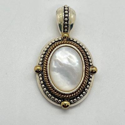 LOT 176: Sterling Silver Pendant Marked GV