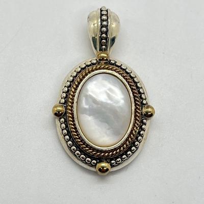 LOT 176: Sterling Silver Pendant Marked GV