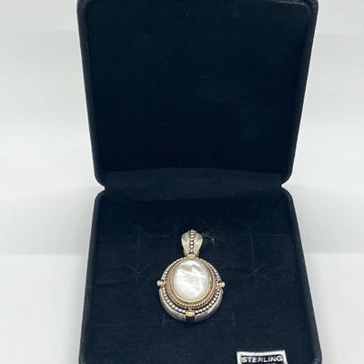 LOT 176: Sterling Silver Pendant Marked GV