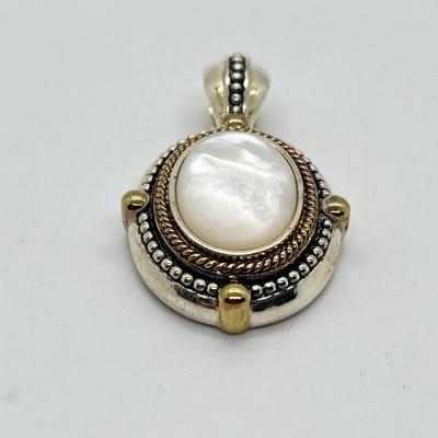 LOT 176: Sterling Silver Pendant Marked GV
