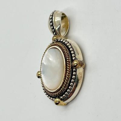 LOT 176: Sterling Silver Pendant Marked GV