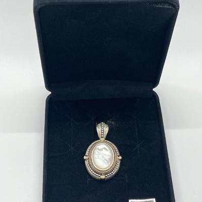 LOT 176: Sterling Silver Pendant Marked GV