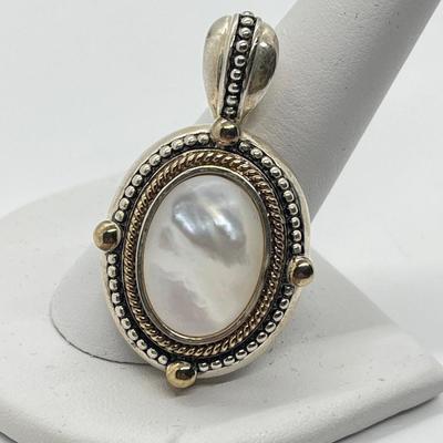 LOT 176: Sterling Silver Pendant Marked GV