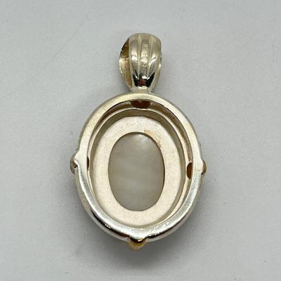 LOT 176: Sterling Silver Pendant Marked GV