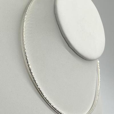 LOT 180: Sterling Silver 18" Diamond Cut Omega Wire Necklace