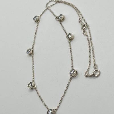 LOT 181: Sterling Silver Diamonique 7-Stone Bezel Set Pendant on 15" Necklace w/ 2" Ext.