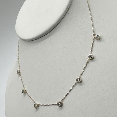 LOT 181: Sterling Silver Diamonique 7-Stone Bezel Set Pendant on 15" Necklace w/ 2" Ext.