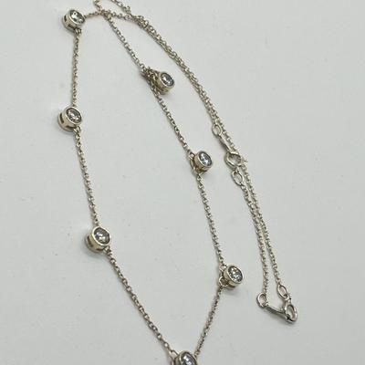 LOT 181: Sterling Silver Diamonique 7-Stone Bezel Set Pendant on 15" Necklace w/ 2" Ext.