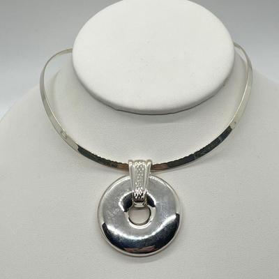 LOT 183: Sterling Silver Reversible Pendant w/Collar and three Colored Leather Cords