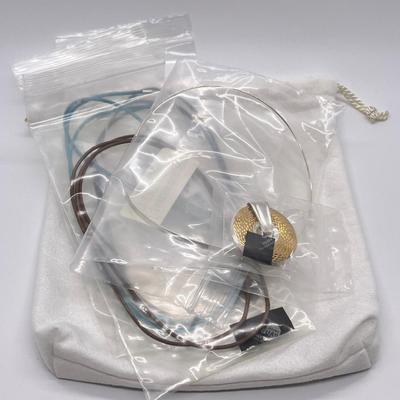 LOT 183: Sterling Silver Reversible Pendant w/Collar and three Colored Leather Cords
