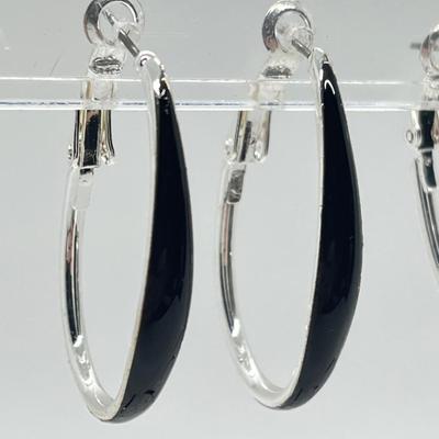 LOT 188: Four Pairs Teardrop Hoop Earrings