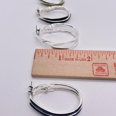 LOT 188: Four Pairs Teardrop Hoop Earrings