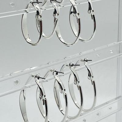 LOT 188: Four Pairs Teardrop Hoop Earrings