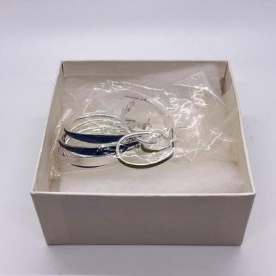 LOT 188: Four Pairs Teardrop Hoop Earrings
