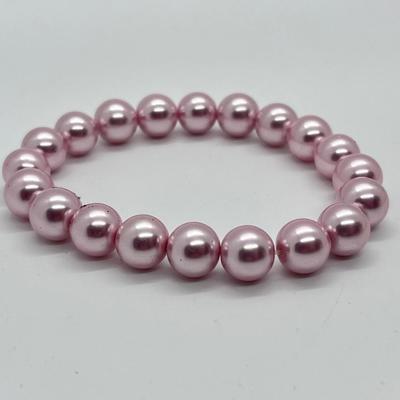 LOT 200: Six Beaded Stretch Bracelets & Isaac Mizrahi Fashion Watch (Needs Battery - No Boxes)