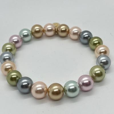 LOT 200: Six Beaded Stretch Bracelets & Isaac Mizrahi Fashion Watch (Needs Battery - No Boxes)