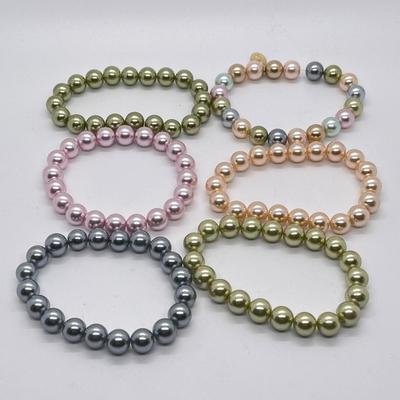LOT 200: Six Beaded Stretch Bracelets & Isaac Mizrahi Fashion Watch (Needs Battery - No Boxes)