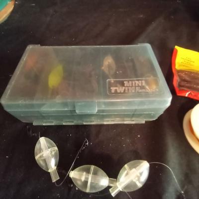 LOT 28 NEW MITCHELL FISHING REEL AND LURES