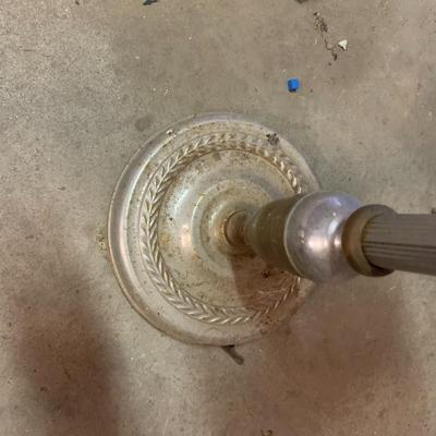 old metal stand with amber glass ashtray