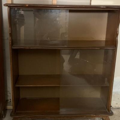 Vintage / antique book case with sliding glass doors.