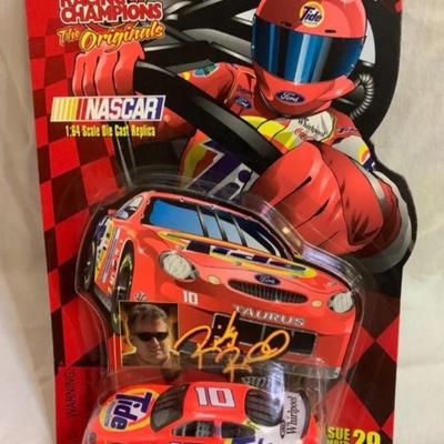 3 NASCAR items - 2 cars and 1 Starting Lineup Figure 4.5â€ tall approx