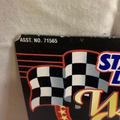 3 NASCAR items - 2 cars and 1 Starting Lineup Figure 4.5â€ tall approx