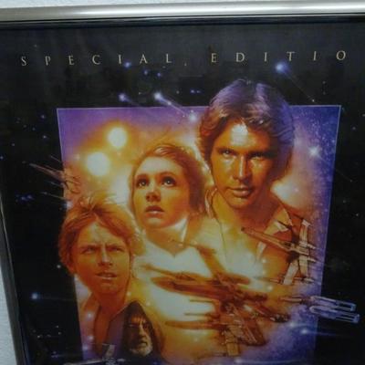 LOT 113. FRAMED STAR WARS POSTER