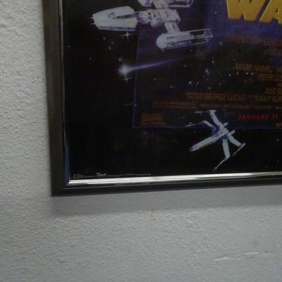 LOT 113. FRAMED STAR WARS POSTER