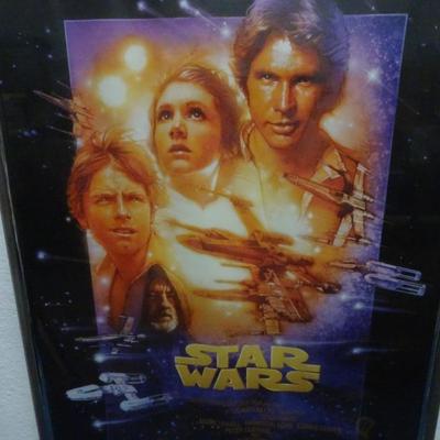 LOT 113. FRAMED STAR WARS POSTER
