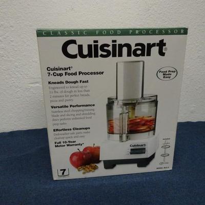 LOT 130. CUISINART 7 CUP FOOD PROCESSOR (NEVER USED IN BOX)
