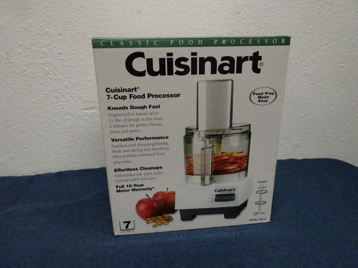 LOT 130. CUISINART 7 CUP FOOD PROCESSOR (NEVER USED IN BOX