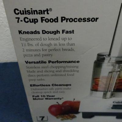 LOT 130. CUISINART 7 CUP FOOD PROCESSOR (NEVER USED IN BOX)