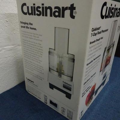 LOT 130. CUISINART 7 CUP FOOD PROCESSOR (NEVER USED IN BOX)