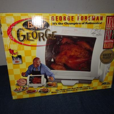 LOT 132. GEORGE FOREMAN ROASTING MACHINE