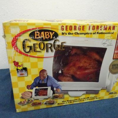 LOT 132. GEORGE FOREMAN ROASTING MACHINE