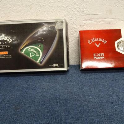 LOT 157. BOX OF CALLAWAY GOLF BALLS AND PUTTING RETURN MACHINE