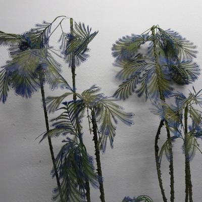 LOT 163 TWO  VINTAGE PLASTIC DECORATIVE PLANTS.  (65" TALL)