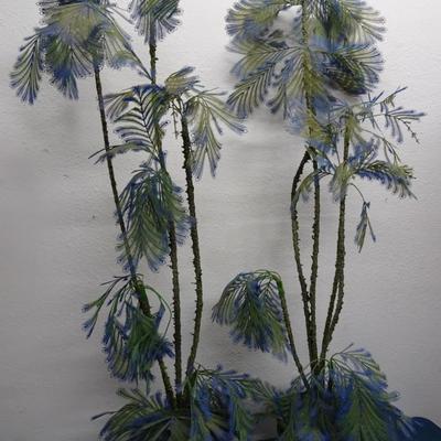 LOT 163 TWO  VINTAGE PLASTIC DECORATIVE PLANTS.  (65" TALL)