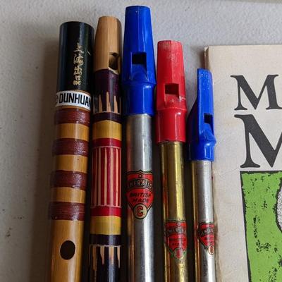 Collection of Vintage Flutes and Music Books